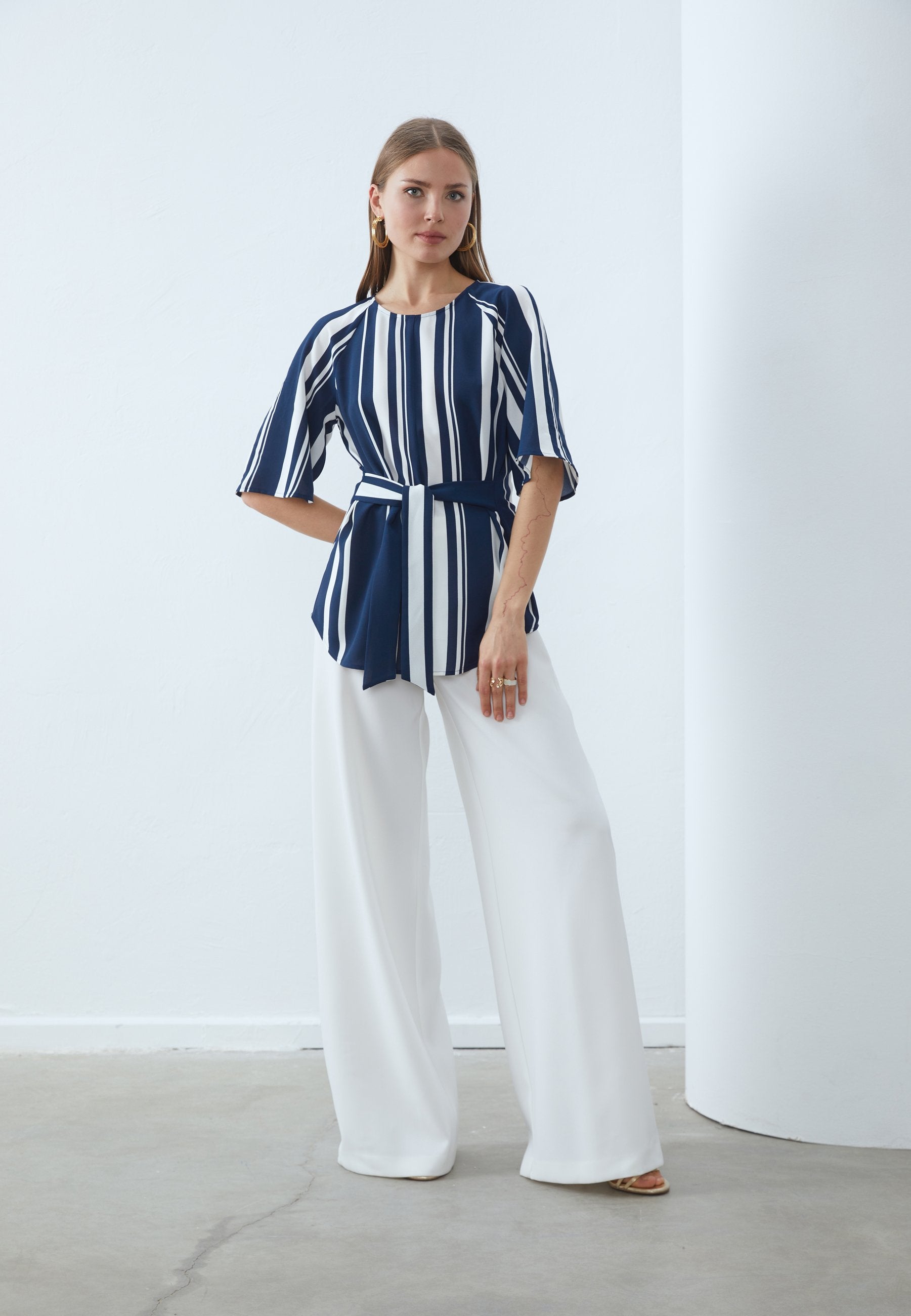 Alonic Women's Navy Blue and White Striped Peplum Top