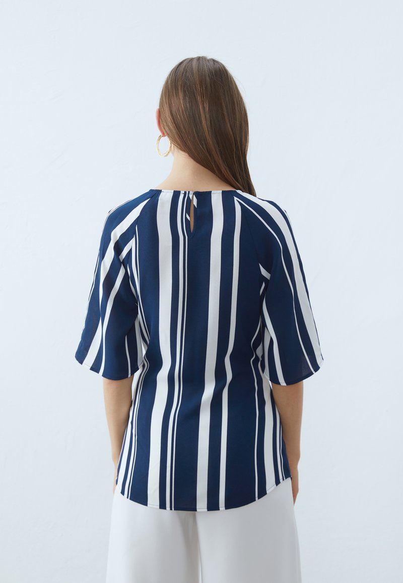 Alonic Women's Navy Blue and White Striped Peplum Top